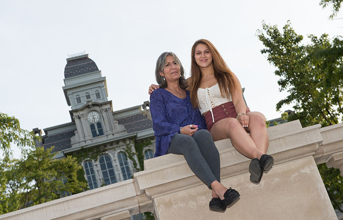 Photo of parent and student in front of the Hall of Languages