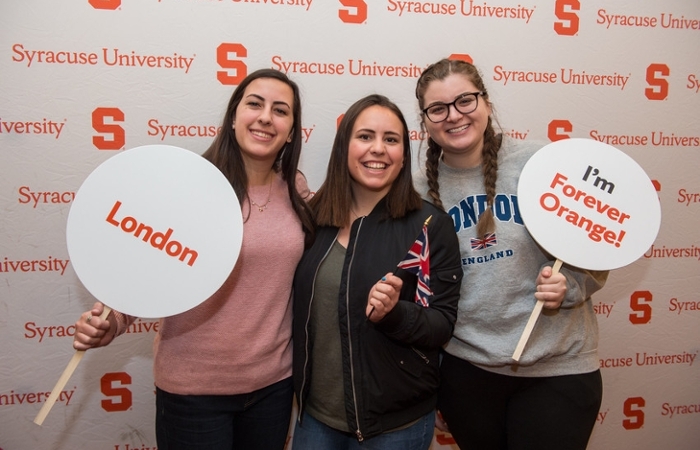 Students with London and I'm Forever Orange signs