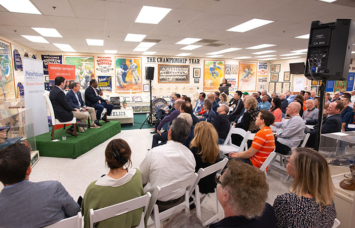 Panel speakers and audience at SU Athletics Meet and Greet event