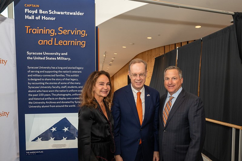 Felicia L. Walker ’87 and Jeffrey Saferstein ’86 with Chancellor Syverud at the unveiling of the Captain Floyd Ben Schwartzwalder Hall of Honor.