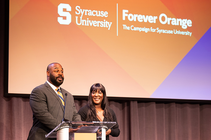 Our hosts, Life Trustee Donovan McNabb ’98 and Trustee Roxi McNabb ’98, G’99 welcome guests 